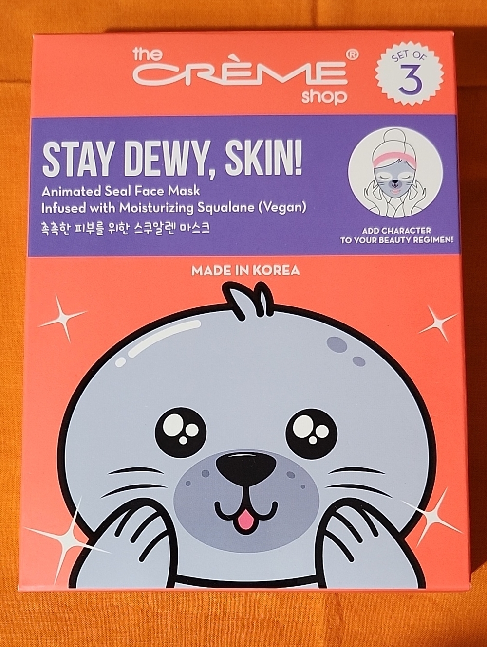 Crèmè shop stay dewy skin mask, animated seal face mask.